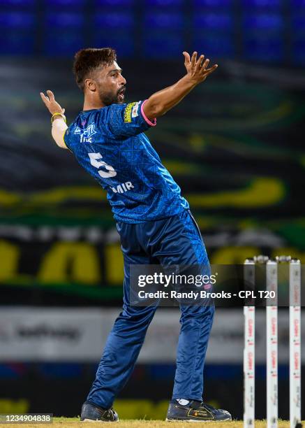 Mohammad Amir of Barbados Royals celebrates the dismissal of Lendl Simmons of Trinbago Knight Riders during the 2021 Hero Caribbean Premier League...