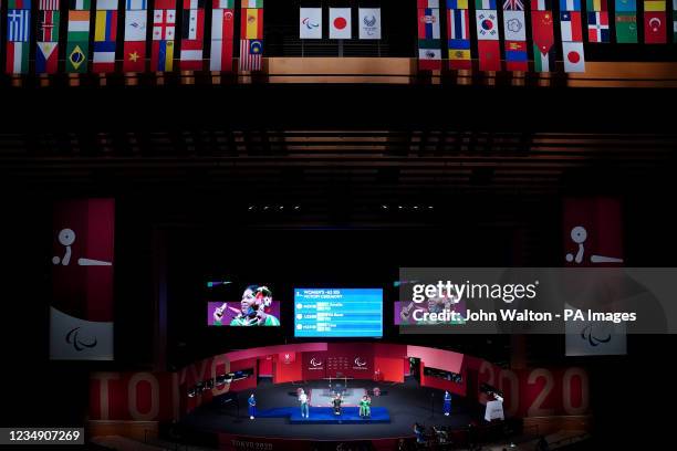 Uzbekistan's Ruza Kuzieva with silver , Mexico's Amalia Perez with gold and Nigeria's Lucy Ejike with bronze on the podium after the Powerlifting...