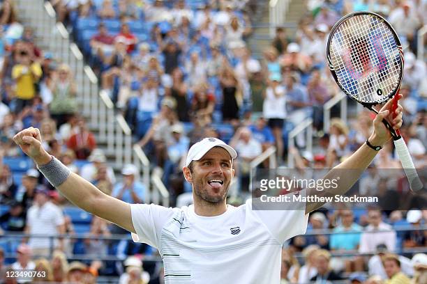 Mardy Fish of the United States celebrates after defeating Kevin Anderson of South Africa during Day Six of the 2011 US Open at the USTA Billie Jean...