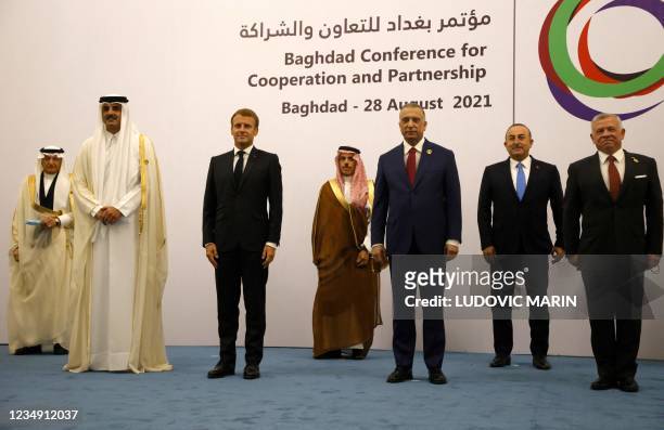Qatars Emir Sheikh Tamim al-Thani, French President Emmanuel Macron, Saudi Foreign Minister Faisal bin Farhan, Iraq's Prime Minister Mustafa...