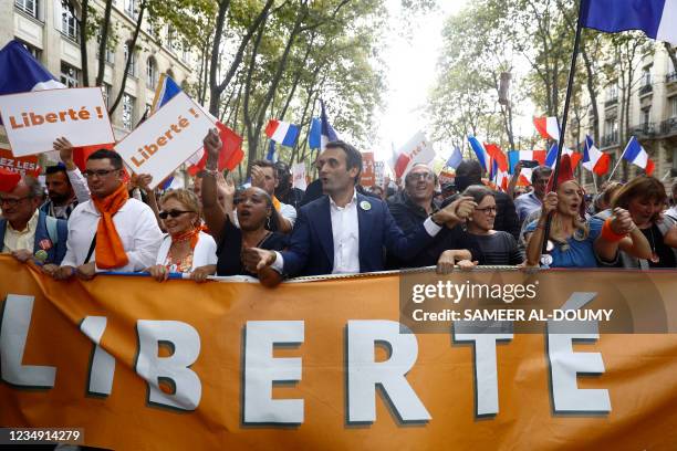 French nationalist party "Les Patriotes" leader Florian Philippot and lawyer Fabrice di Vizio march during a rally called by his party against the...