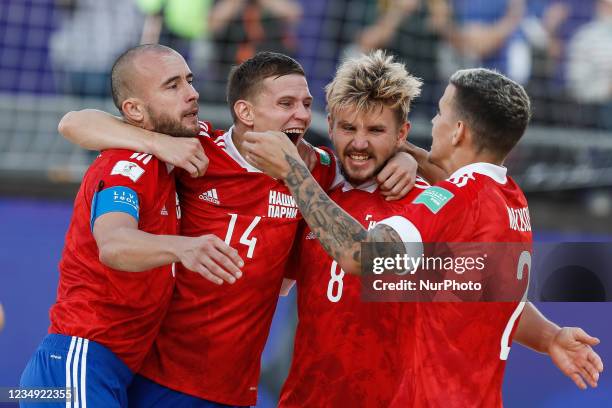 Andrey Kotenev of Football Union Of Russia celebrates his goal with Anton Shkarin , Ostap Fedorov and Andrei Novikov during the FIFA Beach Soccer...