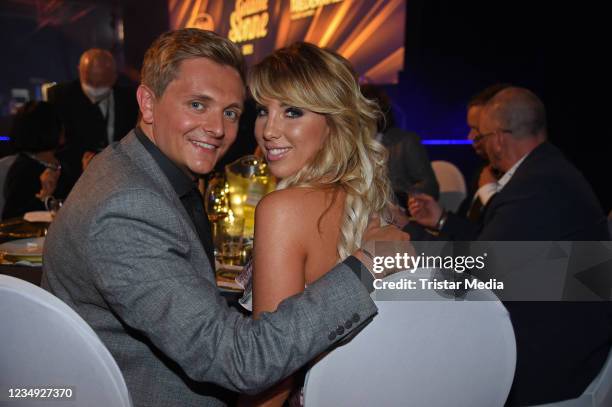 Annemarie Eilfeld and her boyfriend Tim Sandt during the Goldene Sonne Award 2021 at Wunderland on August 28, 2021 in Kalkar, Germany.