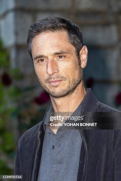 French film director Jeremie Elkaim poses during a photocall for the film « Ils sont vivants » during the 14th Francophone film festival in...