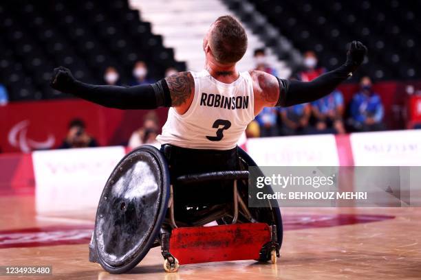 Britain's Stuart Robinson celebrates victory in the wheelchair rugby gold medal match between Britain and the US during the Tokyo 2020 Paralympic...