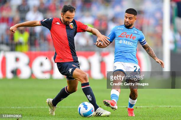 Milan Badelj of Genoa and Lorenzo Insigne of Napoli vie for the ball during the Serie A match between Genoa Cfc and Ssc Napoli at Stadio Luigi...