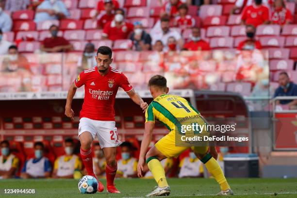 Pizzi of SL Benfica battle for the ball during the Liga Bwin Match between Benfica and CD Tondela at Estadio da Luz on August 29, 2021 in Lisbon,...