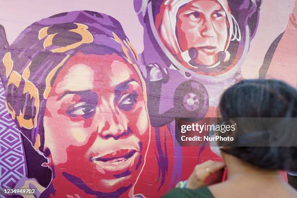 The inauguration of the feminist mural after being repainted by members of UNLOGIC artistic group. The mural appeared vandalized during the past...