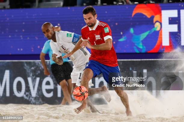 Aleksey Makarov of Football Union Of Russia and Ozu Moreira of Japan vie for the ball during the FIFA Beach Soccer World Cup Russia 2021 final match...