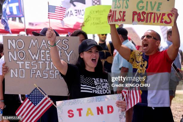 Anti-vaccination protesters take part in a rally against Covid-19 vaccine mandates, in Santa Monica, California, on August 29, 2021.