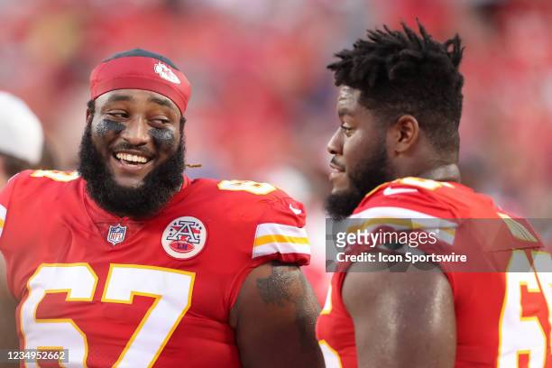 Kansas City Chiefs offensive lineman Lucas Niang and Trey Smith on the sidelines during an NFL preseason game between the Minnesota Vikings and...