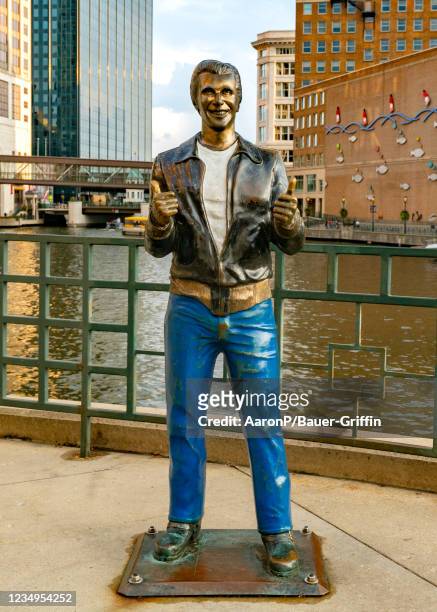 General view of the 'Bronze Fonz' statue of actor Henry Winkler in Downtown Milwaukee at the Milwaukee river on August 29, 2021 in Milwaukee,...
