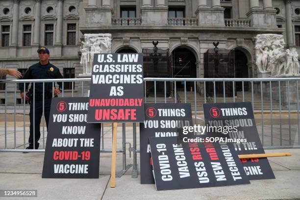 Placards seen in front of the Pennsylvania State Capitol fence during the anti-vaccine, anti-mask mandate Rally for Freedom. Anti-vaccine protesters...