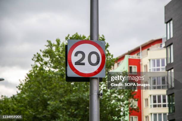 Mile only' road sign seen on a road.