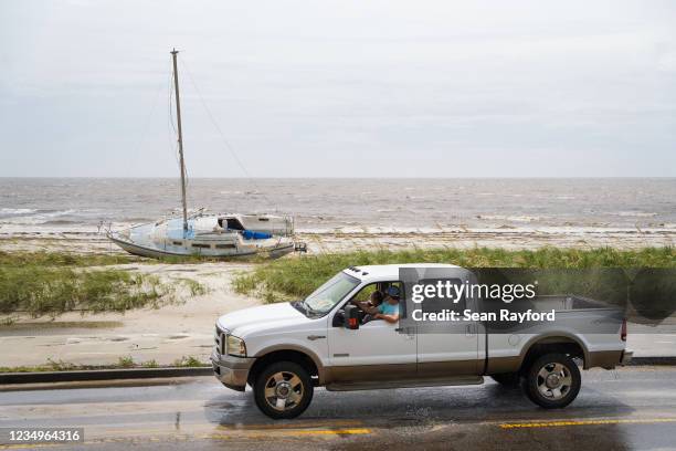 Sailboat sits on the ground near Beach Blvd. After Hurricane Ida passed on August 30, 2021 in Gulfport, Mississippi. Ida made landfall as a Category...