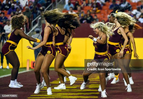 Washington Football Team cheerleader perform during the preseason NFL game between the Baltimore Ravens and the Washington Football Team on August...