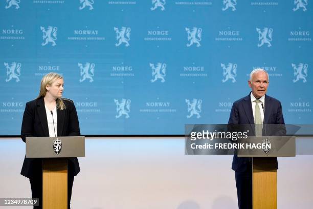 Norway's Minister of Finance Jan Tore Sanner and Norway´s Minister of Petroleum and Energy Tina Bru speak at a press conference about restructuring...