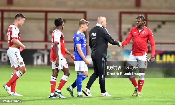 Ben Petty Leicester City development squad manager with Darnell Johnson of Fleetwood Town after the Papa John's Trophy match between Fleetwood Town...