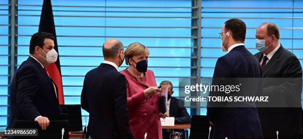German Labour Minister Hubertus Heil, German Finance Minister and Vice-Chancellor Olaf Scholz, German Chancellor Angela Merkel, German Health...