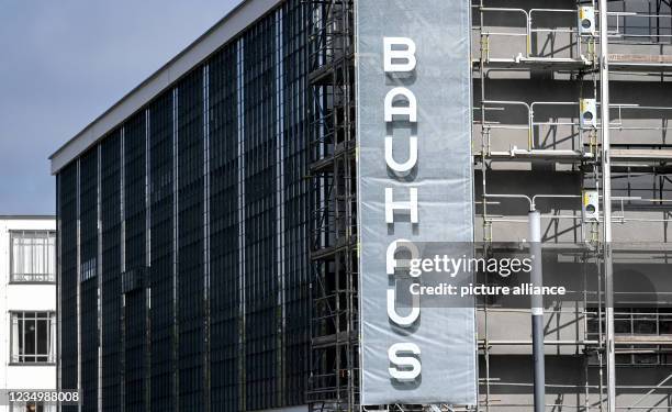 September 2021, Saxony-Anhalt, Dessau-Roßlau: The Bauhaus building in Dessau is scaffolded. Since the Bauhaus Dessau Foundation has a new director....