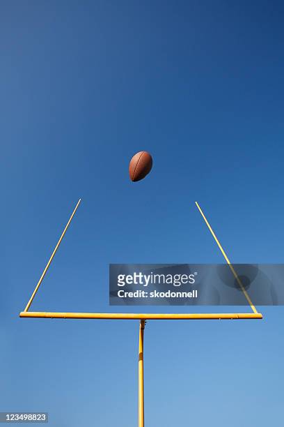 football field goal - football goal post stock pictures, royalty-free photos & images