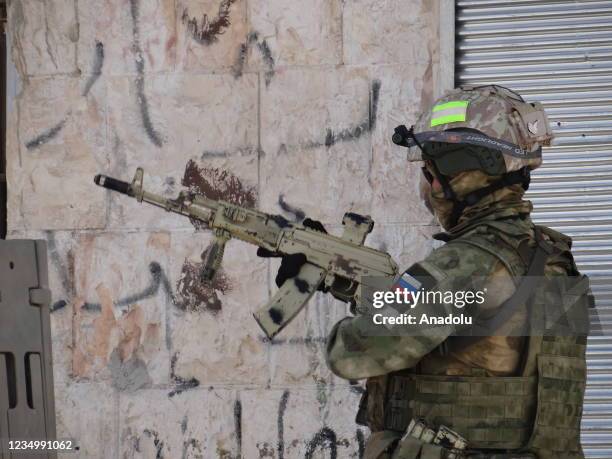 Photo shows Russian troops entering in the Syrian district of Daraa al-Balad in Syria's southern province of Daraa, Syria on September 01, 2021. A...