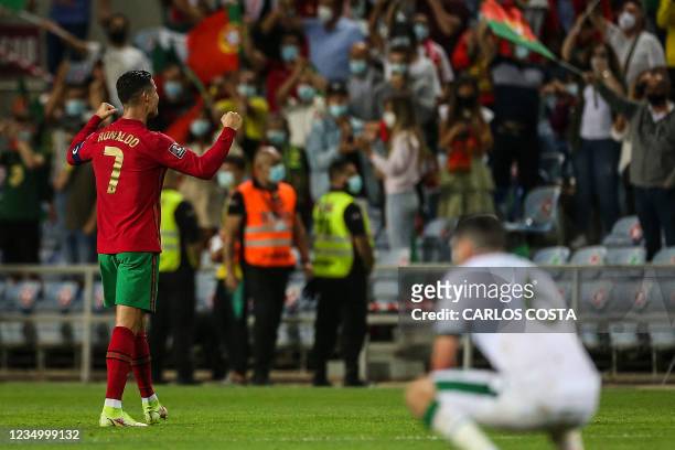 Portugal's forward Cristiano Ronaldo celebrates after scoring a goal during the FIFA World Cup Qatar 2022 European qualifying round group A football...