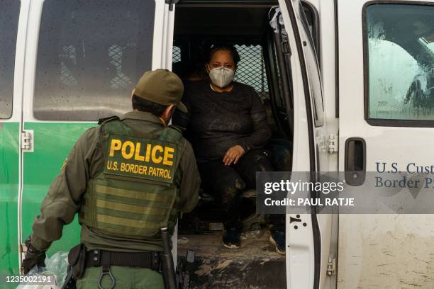 An Ecuadorian woman is pictured in a United States Border Patrol transport vehicle in Sunland Park, New Mexico on September 1, 2021.