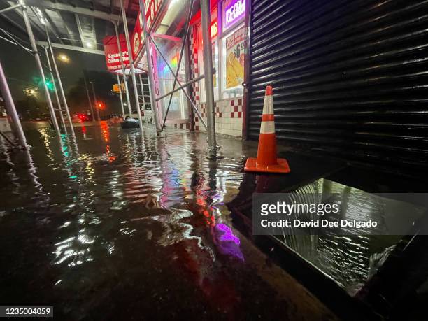 Rainfall from Hurricane Ida flood the basement of a Kennedy Fried Chicken fast food restaurant on September 1 in the Bronx borough of New York City....