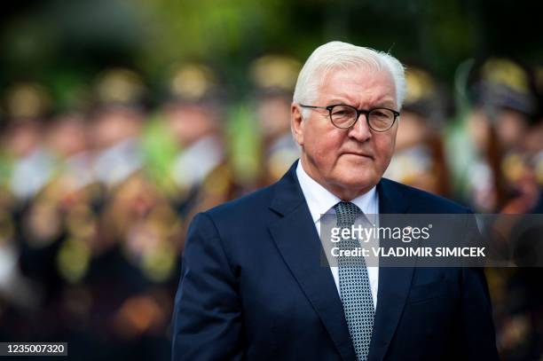 German President Frank-Walter Steinmeier reviews the Slovak guard of honour during a welcome ceremony at the Presidential palace in Bratislava on...