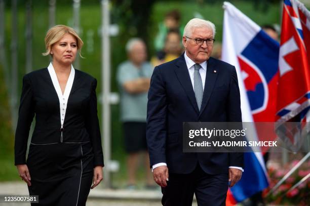 President of Slovakia Zuzana Caputova and German President Frank-Walter Steinmeier review the Slovak guard of honour during a welcome ceremony at the...