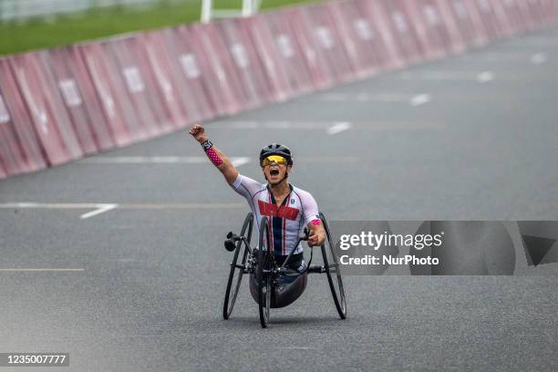 Tokyo, Japan. Oksana Masters of the United States celebrates after winning at Women's H5 cycling road race at the Tokyo Paralympics on Sept. 1 at...