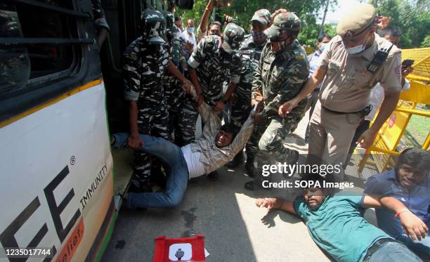 Activists of Indian Youth Congress are being detained by security personnel while shouting slogans against Prime Minister Narendra Modi government...