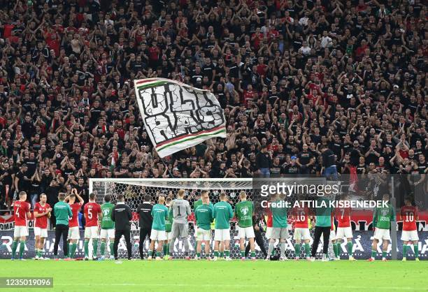 Hungary's team reacts to the fans after the FIFA World Cup Qatar 2022 qualification Group I football match between Hungary and England, at the Puskas...