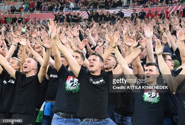 Hungary's fans react prior to the FIFA World Cup Qatar 2022 qualification Group I football match between Hungary and England, at the Puskas Arena in...