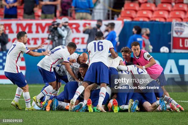 United States players rush the field to celebrate after the United States defeated Mexico in the CONCACAF Nations League finals on June 06 at Empower...