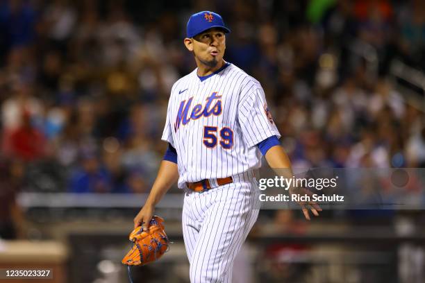 Pitcher Carlos Carrasco of the New York Mets walks off the mound in the sixth inning against the Miami Marlins at Citi Field on September 2, 2021 in...