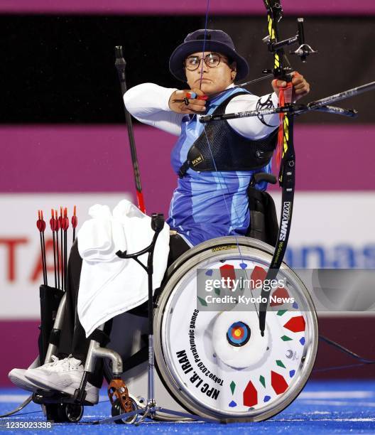 Zahra Nemati of Iran competes in the women's archery individual recurve at the Tokyo Paralympics en route to winning gold on Sept. 2 at Yumenoshima...