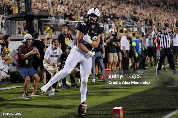 Alec Holler of the UCF Knights celebrates his touchdown catch against Boise State Broncos at the Bounce House on September 2, 2021 in Orlando,...
