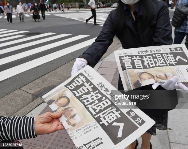 An extra edition of a daily newspaper reporting on Japans Prime Minister Yoshihide Suga deciding not to run for the Liberal Democratic Party...