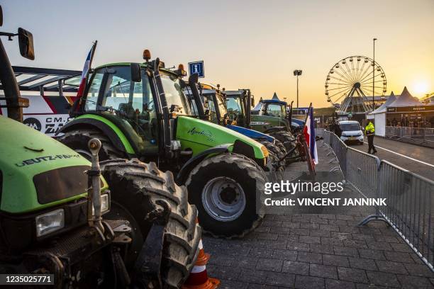Farmers protest with tractors lined up along the access road, at the entrance of the circuit the Formula 1 circuit of Zandvoort, on September 3,...