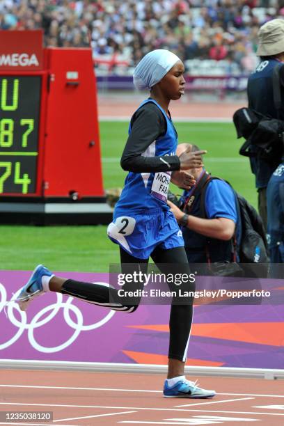 Zamzam Mohamed Farah representing Somalia crosses the line in heat 1 of the women's 400 metres during day 7 of the 2012 Summer Olympics at the...