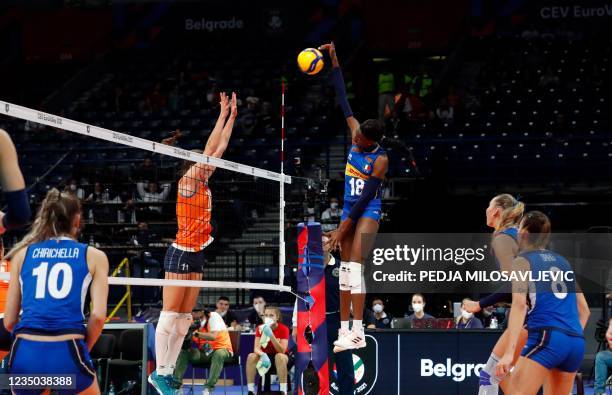 Italy's Paola Ogechi Enolu spikes the ball during the 2021 women's CEV EuroVolley semi-final volleyball match between the Netherlands and Italy in...