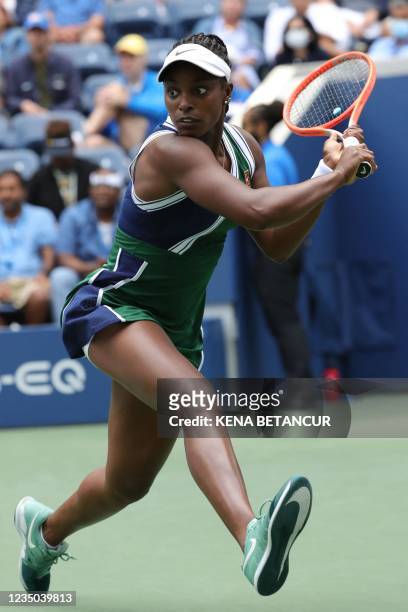 S Sloane Stephens hits a return to Germany's Angelique Kerber during their 2021 US Open Tennis tournament women's singles third round match at the...