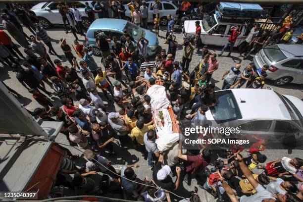 Palestinians participate in the funeral of Ahmad Saleh, 26 years old in Jabaliya refugee camp, northern Gaza Strip. Funeral of Ahmad Saleh, 26 years...