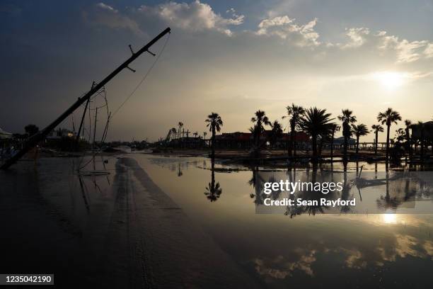 Road is partially covered in floodwater in the wake of Hurricane Ida on September 3, 2021 in Grand Isle, Louisiana. Ida made landfall as a Category 4...