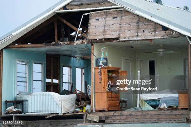 Storm-damaged home is seen in the wake of Hurricane Ida on September 3, 2021 in Grand Isle, Louisiana. Ida made landfall as a Category 4 hurricane...