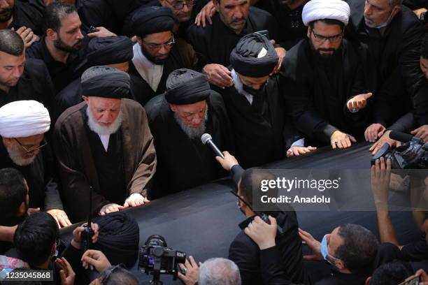 People attend the funeral of Prominent Iraqi Shia cleric Ayatollah Muhammad Saeed al-Hakim in Karbala, Iraq on September 4, 2021. Muhammad Saeed...