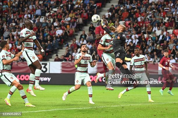 Portugal's goalkeeper Anthony Lopes vies for the ball during the friendly football match between Qatar and Portugal in Debrecen, Hungary, on...