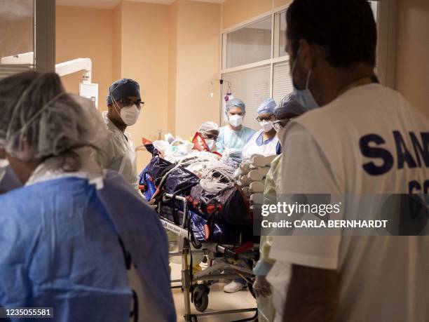 Covid 19 patient is being transferred as part of the Hippocampe operation at the intensive care unit on September 3, 2021 at the University hospital...